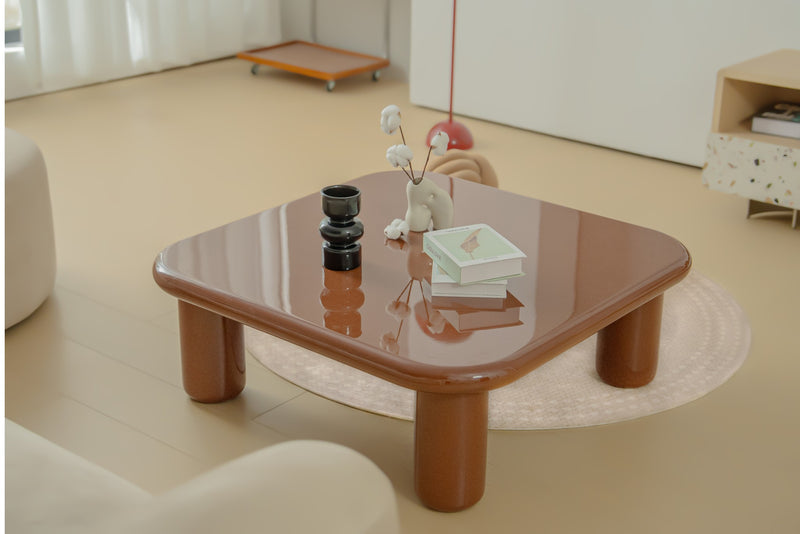Pebble Companions Soft Hue Arc-Edge Coffee Table by Acanva