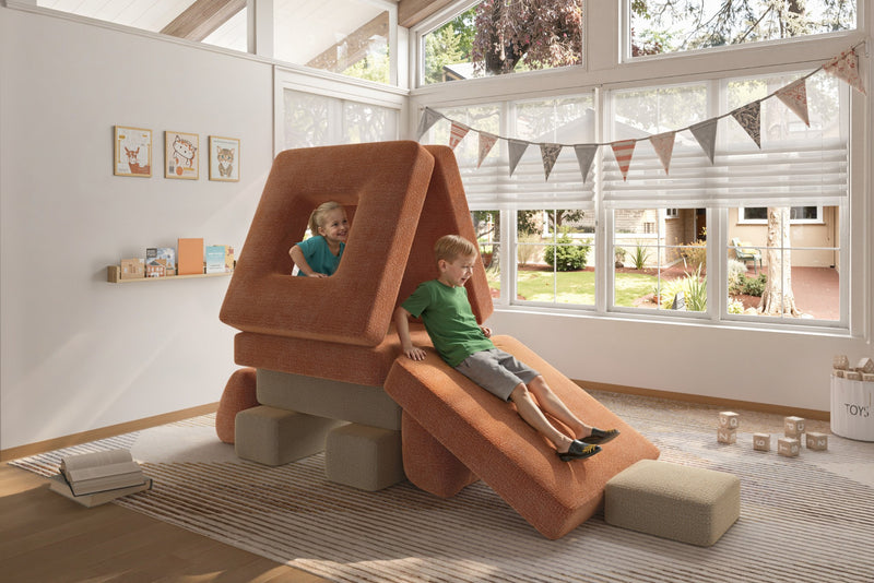 Two children sitting on modular kids play sofas – Mini set by Acanva CushyLand 21
