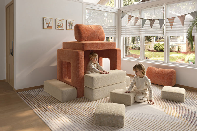 Two children sitting on modular kids play sofas – Mini set by Acanva CushyLand 23