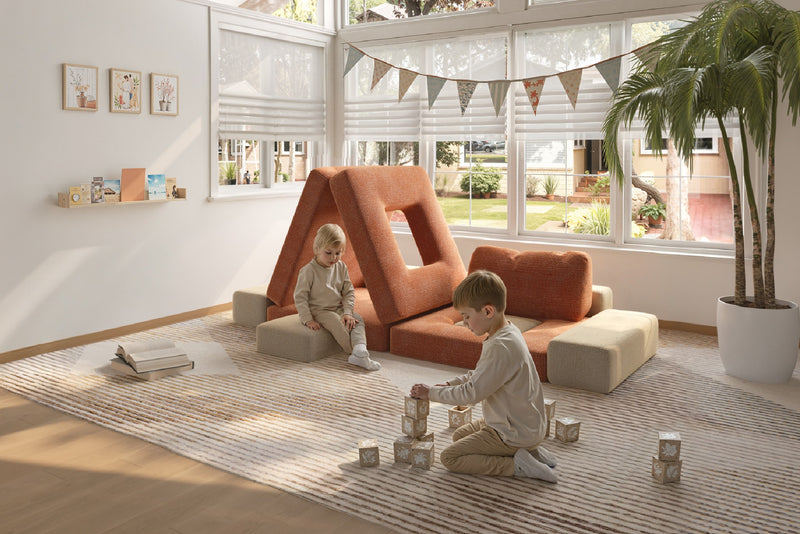 Two children sitting on modular kids play sofas – Mini set by Acanva CushyLand 26